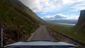 Bealach Na Ba, Scotland, UK - Speeded up 4k footage of driving down the Bealach Na Ba single track road in the Scottish Highlands. Part of the North Coast 500 route. No other vehicles or people.