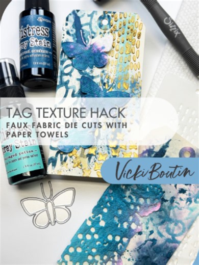 Who knew a paper towel could be a design supply? 💥 Sizzix Licensed Artist Vicki Boutin uses spray inks, the Sizzix Brayer tool head and the Words & Numbers stencil set to create a couple of unique ink applications on tag bases. She then repurposes those towels to die-cut a one-of-a-kind textured, faux “fabric” elements from the Bubble Wrap Background and Stitched Floral die sets for layered tags that feel artsy, grungy, and totally custom. Layer it all up on top of the Sizzix Multimedia Mat for
