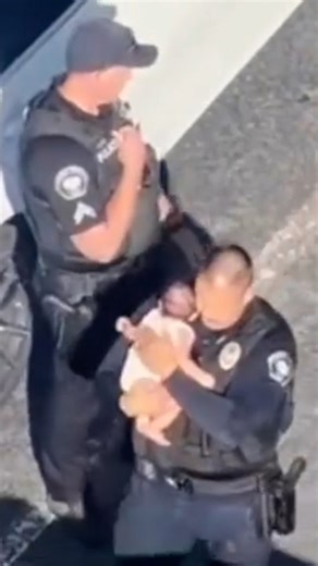 Dramatic video shows the moment Corona, California, police officers were able to break a window and save the life of a baby locked inside as temperatures soared on June 17. The Corona Fire Department determined the internal temperature of the vehicle was 110 degrees, police said. #rescue #california #police #capturedoncamera #bodycam | CBS News