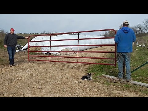 Fixing a metal farm gate with a hinge that broke off