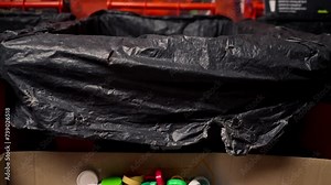 multi-colored caps from used bottles stored at recycling and waste disposal sorting station