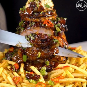 2.3M views · 16K shares | This Teriyaki Style Chicken, Pork & Pineapple Kebab Stack Served On a Bed Of Fries is Looking Like An Absolute Essential 襤 For The Full Recipe & Ingredients List, Just Click The Link: https://m.me/lovefood?ref=w6941185 | Love Food | Facebook