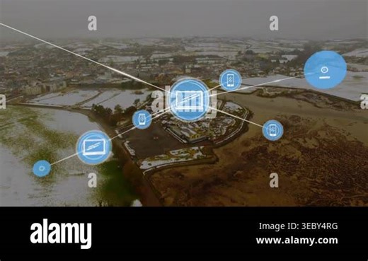 Network scan initiating device icons appearing over flooded fort, showing tech connectivity. Aerial, castle, landscape, winter, snow, overlay, blue Stock Video Footage - Alamy