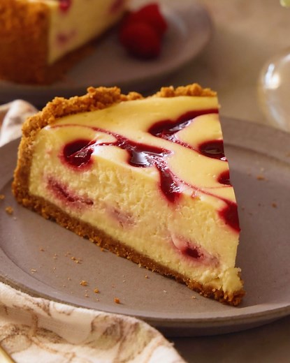 11K views · 277 reactions | Decadent swirled Raspberry Cheesecake is creamy and rich, with a vibrant sweet-tart raspberry sauce ribboned throughout it. Plus, there's no water bath needed for a crack-free cheesecake! | Preppy Kitchen | Facebook