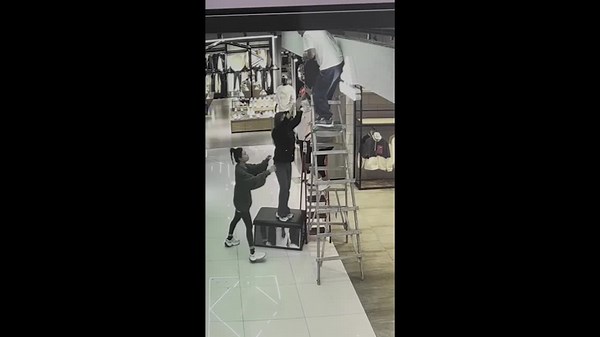 Shopkeeper falls from ladder while trying to fix speaker