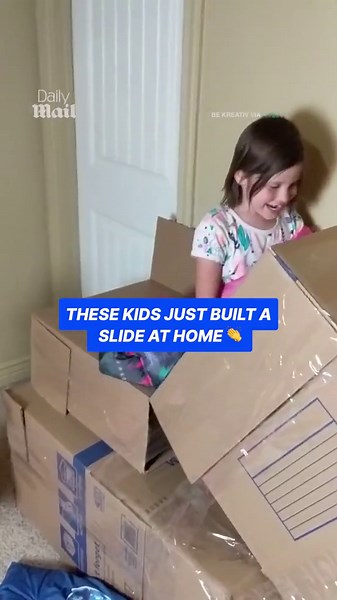 Creative kids build slide on the stairs