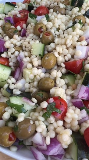 5K views · 60 reactions | This simple Mediterranean pearl couscous salad is bright, delicious, and packed with flavors like olives, tomato, cucumber, and red onions—perfect for serving as a healthy side, lunch, or main. Recipe: https://plantbasedonabudget.com/israeli-couscous-salad/ | Plant-Based on a Budget | Facebook