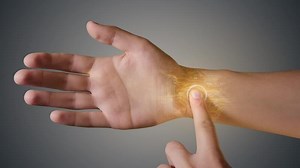 Printed circuit is displayed with built-in microchip in hand