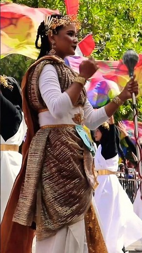 Beautiful Majorette Skillfully Twirls Baton in Marching Band Performance - majorette baton