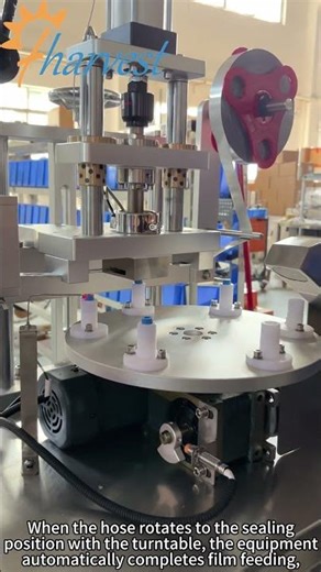 Semi-automatic six-station rotary film sealing machine, small tube foil film sealing machine