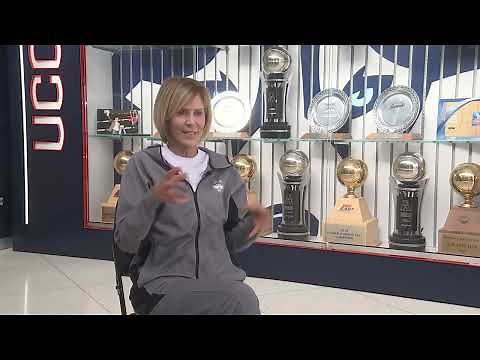 UConn women's basketball associate head coach Chris Dailey celebrates her 40th season