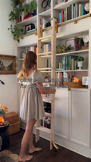 Christi Reeves | Home•Life•DIY on Instagram: "👉🏼From blank wall to home library on a budget. Plot twist: it’s IKEA bookshelves with a little DIY magic ✨ 👉🏼This wall is only 79 1/2”wide so I utilized the 12’ height of my only vaulted ceiling to customize this space, make it more functional & create a built in Library wall on a real life budget. 🔗Comment “DIY” for tips on this build, product list & links. 👉🏼If you love custom looks on a budget, follow along. FOLLOW | LIKE | COMMENT | SHARE 