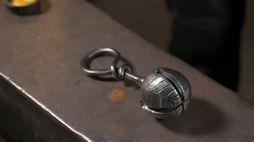 How a sleigh bell is forged by hand