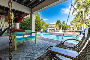 Big Pine Key Vacation Rental | Slice of Paradise: Captivating Open Water Views, Deep Canal, Dockage, Heated Pool, and Pet-Friendly! | Monthly Rentals | Home Rental