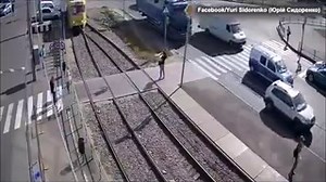Warning, graphic video: Woman hit by train, loses leg