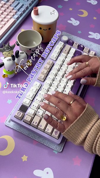 Taro Pastry Keycaps by Tomocaps 💜🥮 I love how different the purple color palette of this set is! It really is the color of taro and it makes my crave taro boba or desserts whenever I use this set 😂🧋🤭 Like all of Tomocaps keycap sets, this set is compatible with many keyboard layouts and comes with lots of novelties 🙌🏽 I wasn’t sure how this set would look on a purple keeb since the purple in the set is darker and muted, but it still looks great on the purple Hi75 😍💜 #keyboard #mechanica