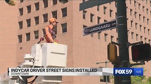 IndyCar drivers help install new street signs ahead of Indy 500