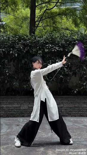 A graceful sword routine flows like a dance!