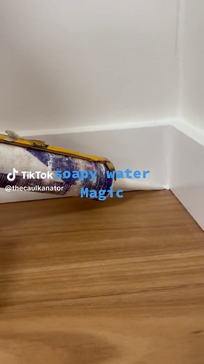 Soapy Water Caulk Method for Satisfying DIY Flooring Installation