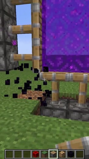 Building a Tower in Minecraft with Red and Grey Blocks