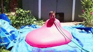 WATCH: Water balloon with guy inside pops in slow-mo