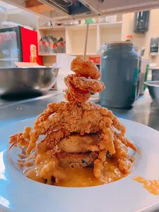 Crab Stack 2.0: Fried Eggplant Medallion, Pan Fried Crab Cake, Fried Soft Shell Crab, Fried Shrimp topped with Louisiana Crawfish Étouffée 🦀 🍤 🦞 #littlebigcup #arnaudville #louisiana #bayou #eat #cajun #crab #crawfish #shrimp #etouffee #crabstack | The Little Big Cup