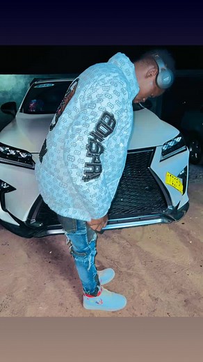 Nighttime Car Interaction in Patterned Outfit