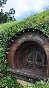 Making our way out of the house at the Hobbiton Movie Set in Tauranga