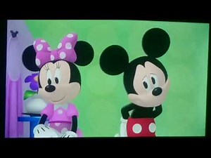 Minnie Kisses Mickey