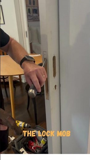 Chisel the lock face into a door of a mortise lock