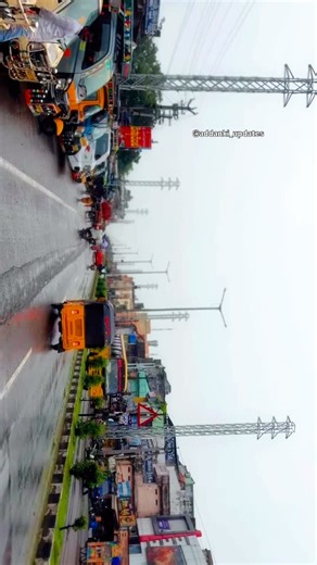 Addanki Updates 🎯2k on Instagram: "🌧️ Addanki in Rain — A Cinematic Vibe 💫 Manchi roju lo Addanki okka style untundi… kani varsham padite Addanki motham magic laga maripothundi 💧✨ Roads shining like mirrors, streets full of life, sound of rain mixing with auto horns, and people running with smiles ☔💙 Every drop tells a story of our town — Addanki ni chooste oka emotional connection untundi ra 💭 E rain look lo Addanki chusina vallaki matram oka word – “Wow Addanki!” ❤️ 📍From Clock Tower to