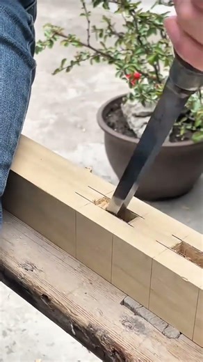 Carving Precise Mortise Joints in a Wood Beam Using a Sharp Metal Chisel