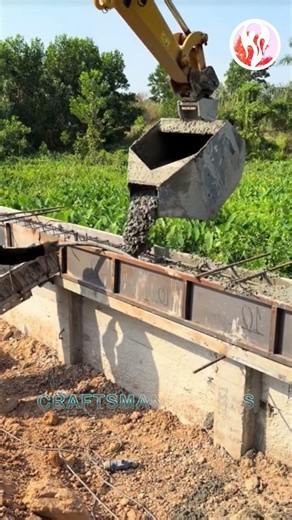 The process of pouring cement to build a wall