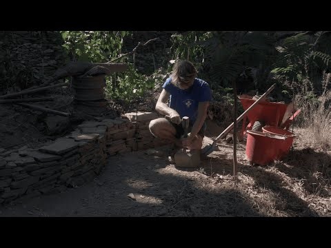 Morning, building a small dry stone retaining wall