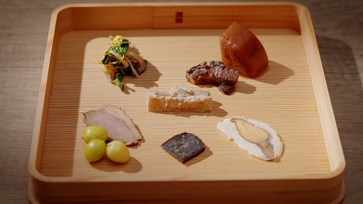 The Art of Washoku explores the soul of Japanese cuisine through Kaiseki, a culinary tradition rooted in Japan’s spiritual and cultural heritage. Originating in the 16th century, Kaiseki evolved from the tea ceremony and emphasizes seasonal ingredients and simplicity. The concept of Ichijū Sansai (one soup, three dishes) reflects nature’s changes. Tea ceremonies and Kaiseki are deeply intertwined, showcasing the artistry of tea bowls crafted by skilled artisans and the delicate, seasonal Japanes