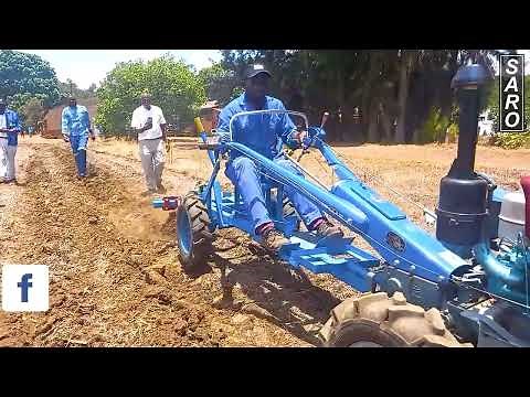 Two Wheel tractor with a plough attached to our very own SARO manufactured tool carrier