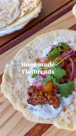 These easy homemade flatbreads are ready in 20 minutes and perfect for just about anything—mezze platters, wraps, or dipping in curry. Don’t skip the garlic butter at the end 😍 ✨ Homemade flatbreads ✨ Ready in: 20 mins Makes: 6 Ingredients: * 300 g plain greek yoghurt * 300 g plain flour * 2 tsp baking powder * 1 tsp salt Garlic butter: * 30 g butter, melted * 1 clove garlic, crushed * 1 Tbsp parsley, finely chopped Method: 1. Add the yoghurt, flour, baking powder and salt to a large bowl. Mix 