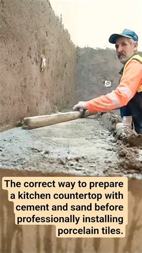 Preparing the kitchen countertop with cement and sand for professional porcelain tile installation