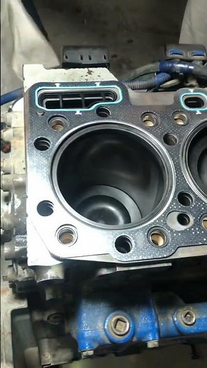 Cat C15 or Perkins 2000 series Head gasket installation in progress