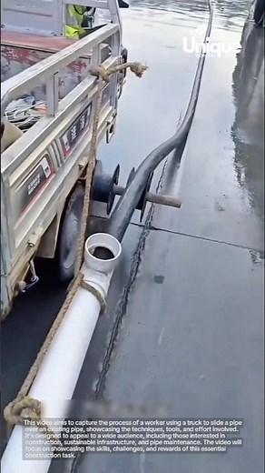 Pipe sliding: worker using a truck to slide a pipe over an existing pipe