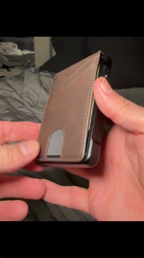 Upgrade your everyday carry 👜💼 with this men’s smart wallet! Made from fu leather 🖤 and sturdy aluminum 🛡️, it holds up to 13 cards 💳, features RFID protection 🛡️, and pops your cards up at the push of a button 🔘. Keep your cash safe with the money clip 💵, attach a chain 🔗 for extra security, and even add a GPS tracker 📍 for peace of mind. Sleek, smart, and built for modern life ✨ SmartWallet #RFIDProtection #LeatherWallet #MinimalistGear #TechAccessories #smartwallet