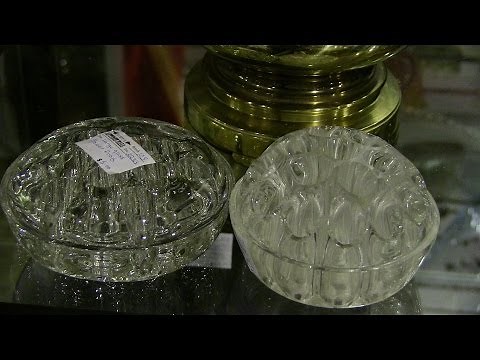 What is a vintage antique glass flower frog?