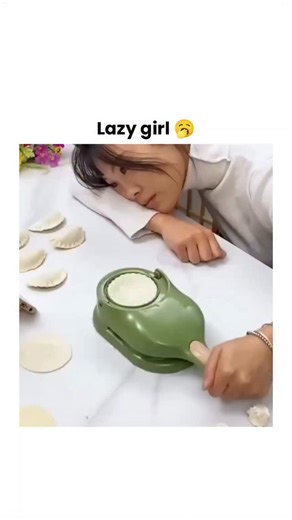 Theviralblendhub on Instagram: "This viral video demonstrates a manual green plastic dumpling maker that simplifies folding and sealing wrappers around filling, producing uniform dumplings in seconds, appealing to home cooks seeking efficiency in Asian cuisine preparation. The post's humor stems from the demonstrator's exaggerated tired pose while effortlessly using the tool, contrasting traditional labor-intensive methods and garnering over 3 million views through relatable "lazy cooking" vibes