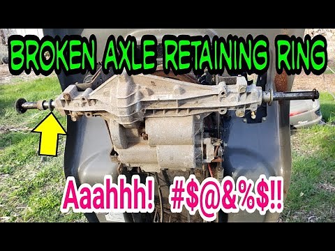 Repairing rear riding lawn mower hydrostatic transaxle. Broken retaining ring.