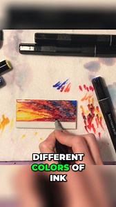 Vera keeps dabbing different colors of ink in her sky. She's using yellow, orange, and red, along with a bright blue, blending some of it with a light gray marker. Watch full demo on the Alcohol Ink Art Community YouTube channel. #alcoholink #art #ink #painting #sky | Alcohol Ink Art Community | Facebook