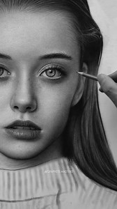 Realistic graphite drawing by artist Wukong Studio (Douyin) — a stunning portrait marked by meticulous detail and flawless tonal control. Ultra-smooth value transitions, lifelike skin texture, and sharp focus on the eyes create an intense sense of realism. Artist: Wukong Studio (Douyin) #realisticdrawing #graphitedrawing #hyperrealism #portraitart #fineart | Graphite Masters