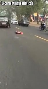 Couple on Bike Killed After Hitting a Car