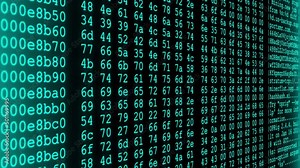 A close-up view of random computerized digits and lower-case letters scrolling continuously on a screen, in cyan color - seamless looping.