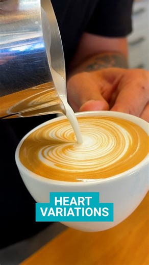 Jimmy pouring out some latte art here with two different variations of the heart pattern ☕️ This clip comes from a recent video tutorial where he demonstrates step by step how barista’s can learn to pour multiple heart variations. Head over to our usual channels to watch the full video. #latteartvideo #latteheart #coffeevideo | Artisti Coffee Roasters