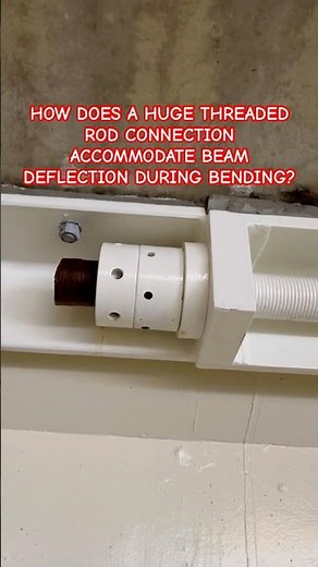 HOW DOES A HUGE THREADED ROD CONNECTION ACCOMMODATE BEAM DEFLECTION DURING BENDING?